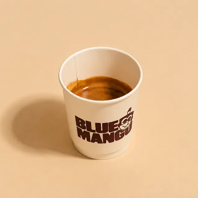 Espresso in a Blue Mango cup