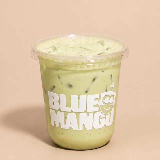 Iced vanilla matcha latte in a Blue Mango cup